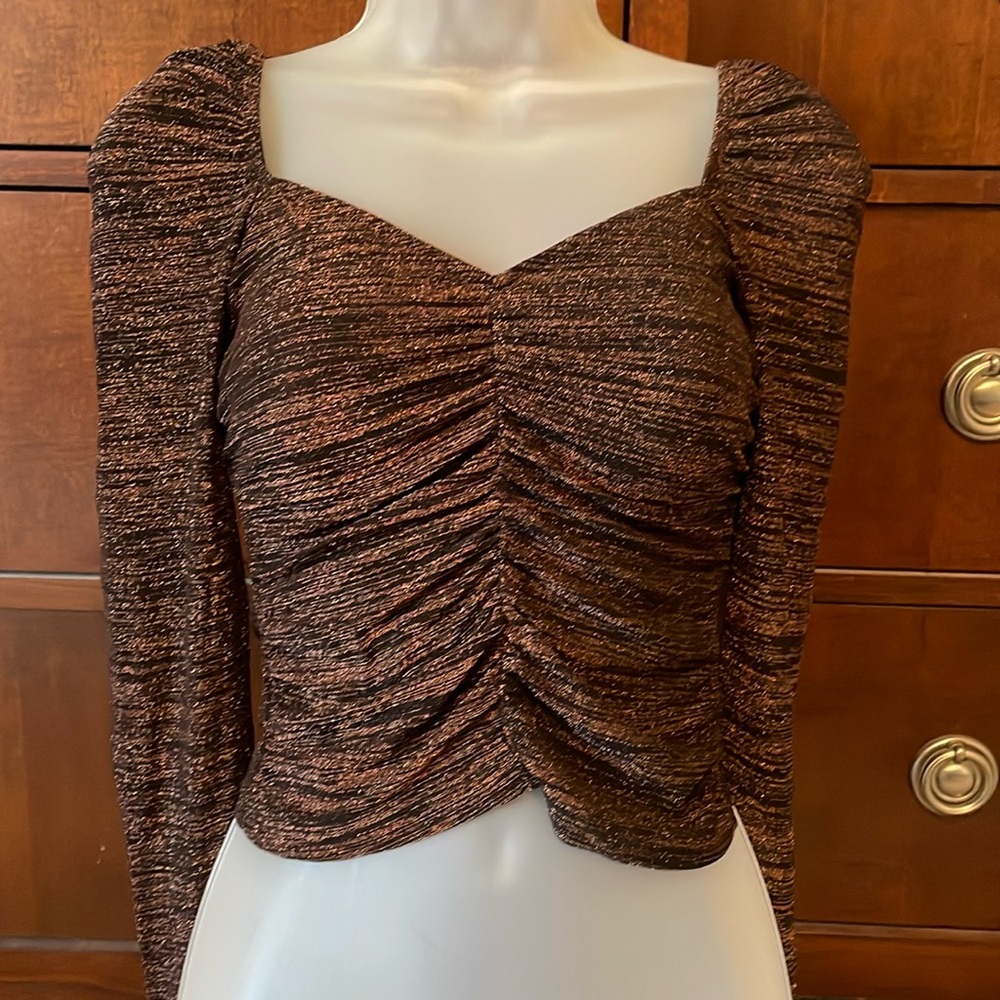 Dressy elegant women’s top in a rich dark brown & deep orange color.